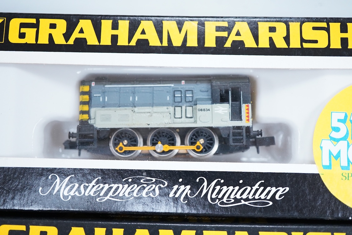 Four boxed Graham Farish N gauge railway diesel and electric locomotives; a BR class 20, D8144 (8204), a Regional Railways class 31, Wigan Pier 31421 (8067), a BR class 08, 08 834, (1002) and an Intercity class 91, 91005